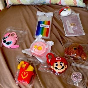 Bundle IPhone Cases & ear pod cases ring stands! Cute all colors. Kids